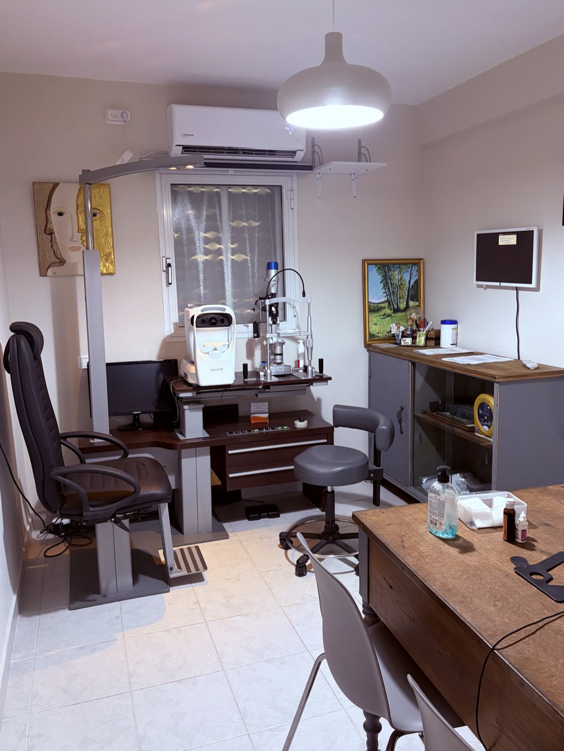 The examination room at Dr. Chassid’s private clinic in Rosh Pina — examination chair, slit lamp and retinal imaging equipment